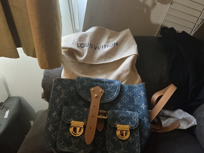 luis vuitton book bag jean real not fake brand new can look up serial number