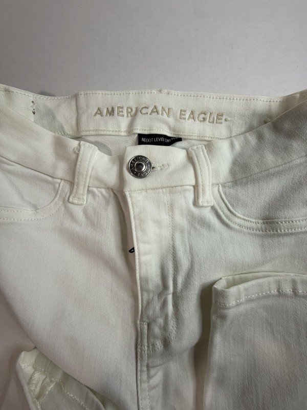 American Eagle Women’s Skinny White Solid Denim Jeans 5-Pocket Button Zip size0 gallery