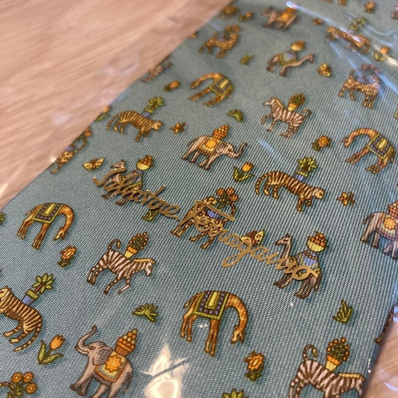 Salvatore Ferragamo Circus Elephant Tie Checkout at Airport