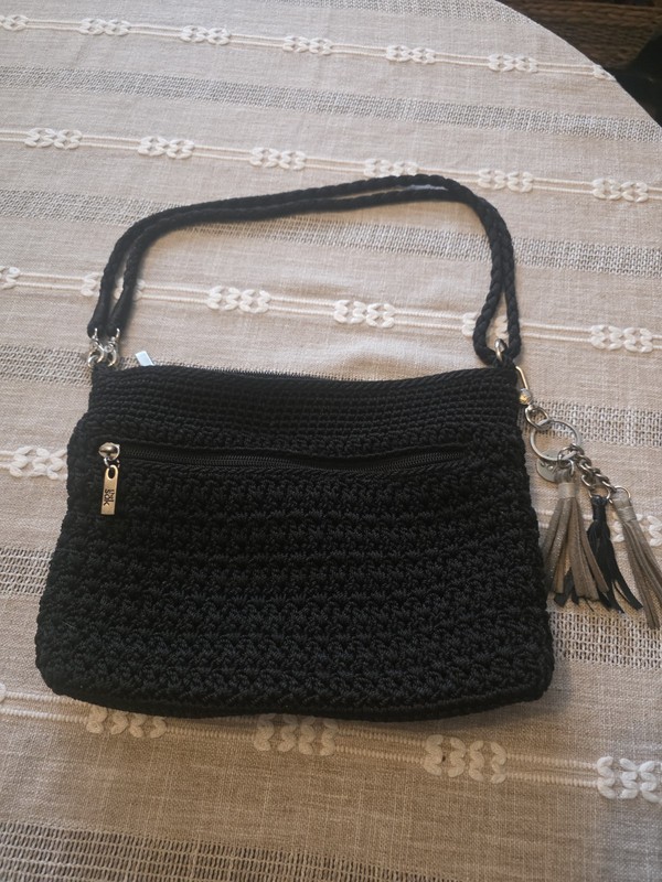 The Sak Black Zip Shoulder Bag Purse w/ Tassel Charm Lined Pockets Silver