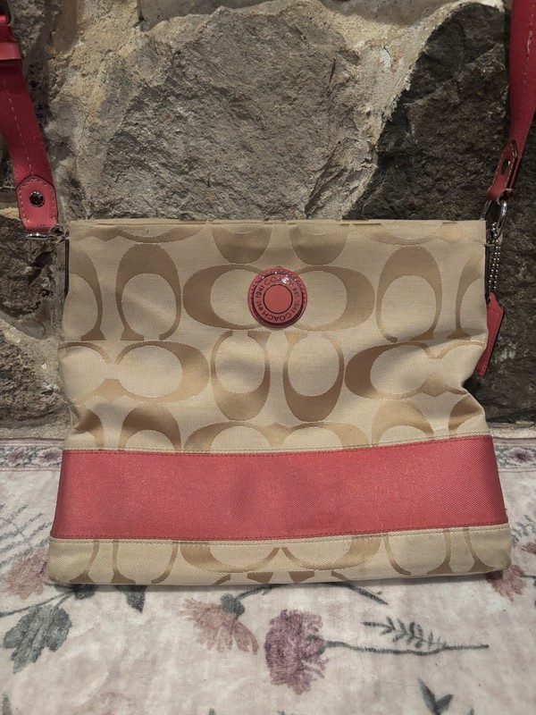 Coach Signature beige & pink logo crossbody bag w/ zip, adjustable strap, charm