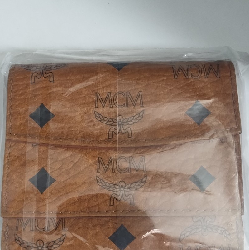 MCM Brown Logo Print Folding Wallet for Unisex with MCM Character Logo Theme gallery