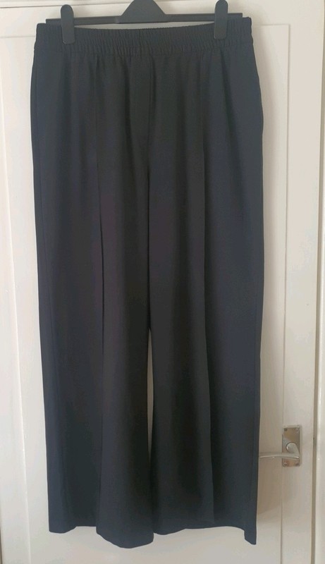 M&S Size 16L Black Wide Leg Trousers with Elastaine Band Waist.