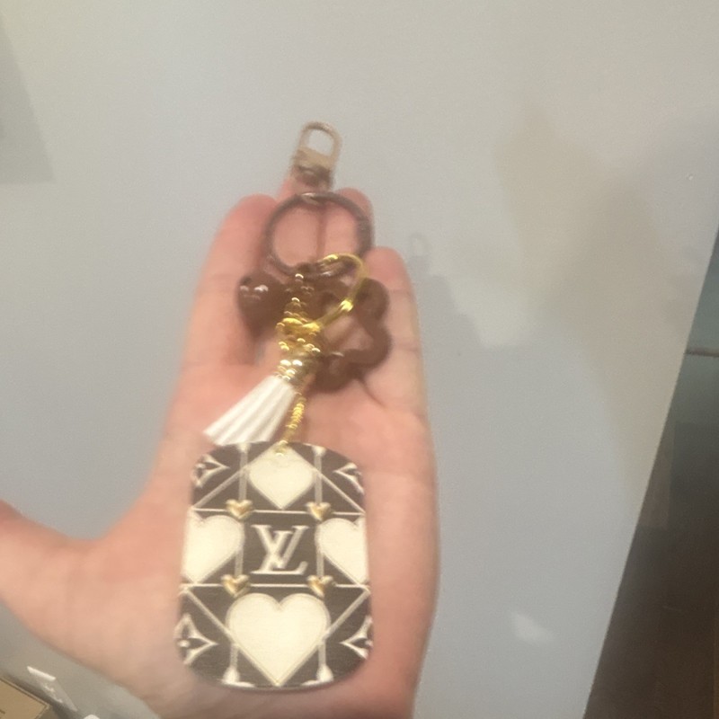 Logo Heart Key Chain with White Tassel, Gold Tone, Black/White