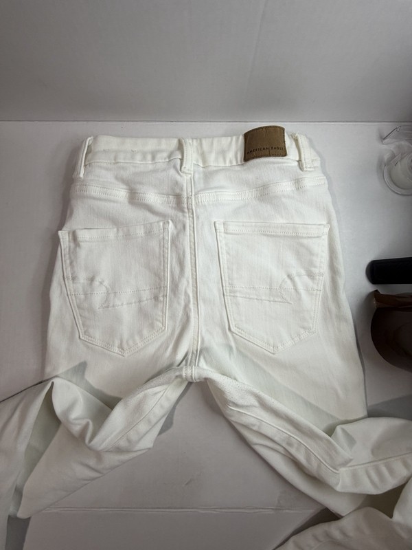 American Eagle Women’s Skinny White Solid Denim Jeans 5-Pocket Button Zip size0 gallery