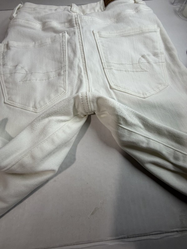 American Eagle Women’s Skinny White Solid Denim Jeans 5-Pocket Button Zip size0 gallery