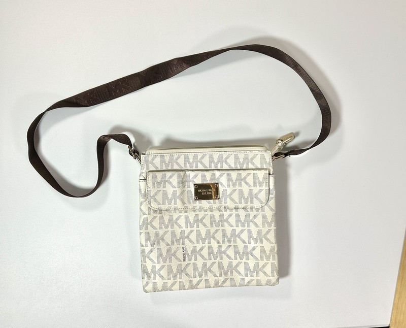 Michael Kors Logo Crossbody Bag in a vanilla/light cream, Brown Strap Gold Tone