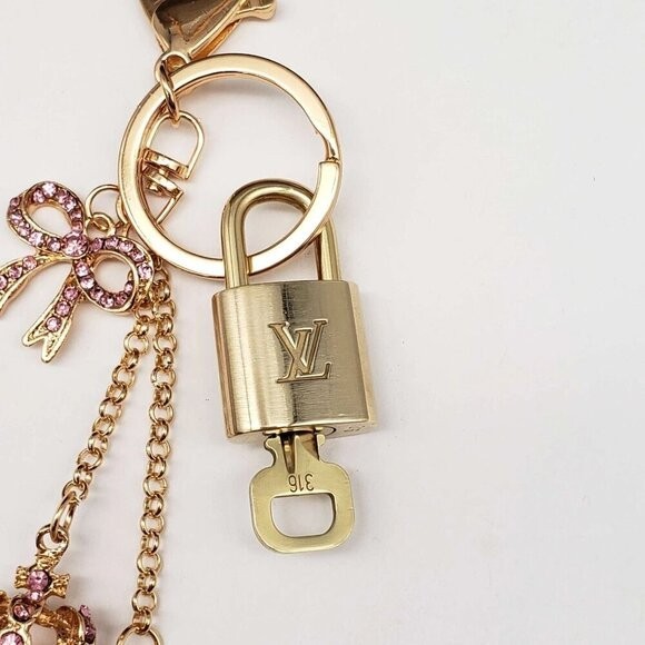 LV Authentic Gold Lock & Key 🔑 Luxury Bag Charm w/ Unbranded Flower Keychain gallery