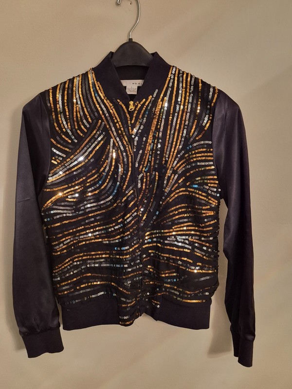 Black satin jacket with gold and silver sequins (size L). Front zipper closure.